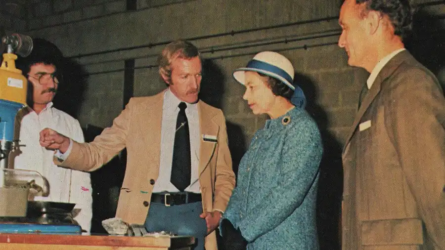 Dr Barry Wills explains the principles of froth flotation to Her Majesty